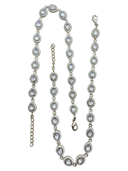Bright-gold anklet pair foil-set with Kundan along a flat chain and a full bell fringe, by Sirini, view 4 of 4
