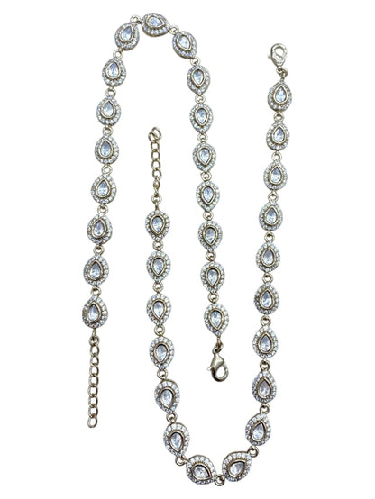 Bright-gold anklet pair foil-set with Kundan along a flat chain and a full bell fringe, by Sirini, view 2 of 4
