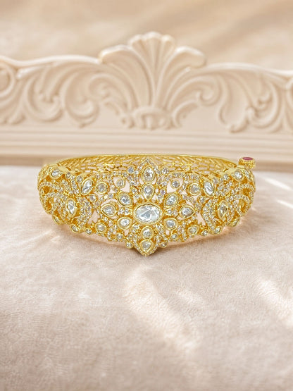 Single broad rigid kada with a carved frame and dense foil-set Kundan, gold-plated, by Sirini Jewellery, view 2 of 2